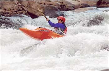 Mona Rowe kayaks on the Youghiogheny River