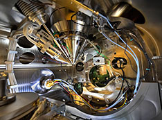 Photo of  the inside of the Helios G5 dual-beam microscope main chamber