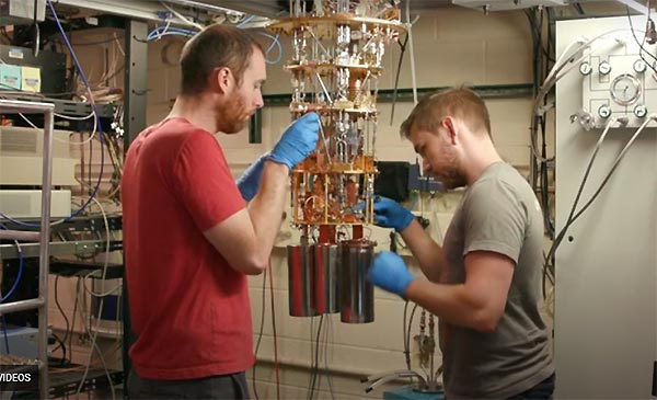 photo of researchers with a quantum computer