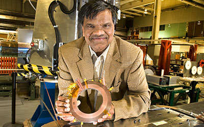 photo of Ramesh Gupta of the Superconducting Magnet Division