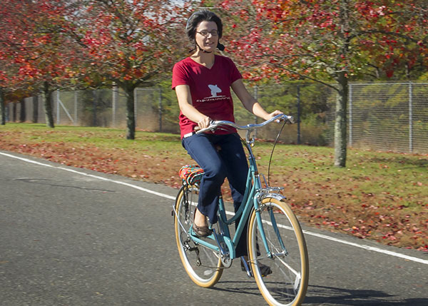 photo of person riding a bicycle