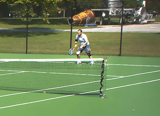 photo of man on tennis court