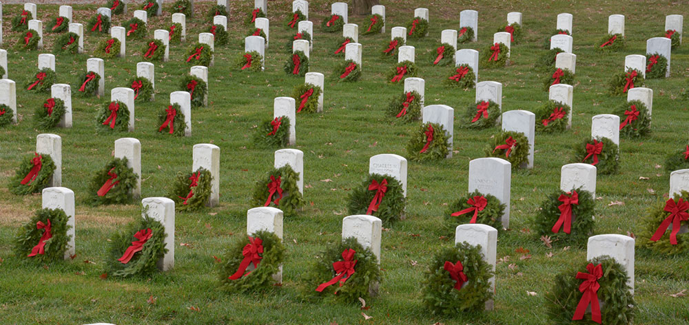 photo of wreaths in a cemetery