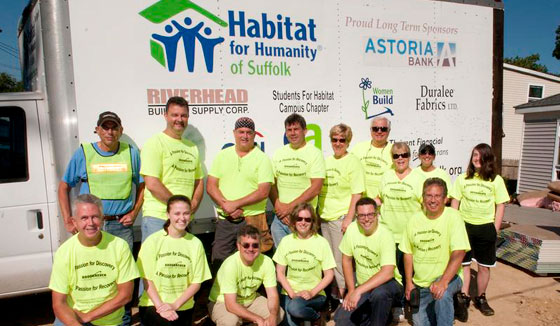photo of employees volunteering with Habitat for Humanity