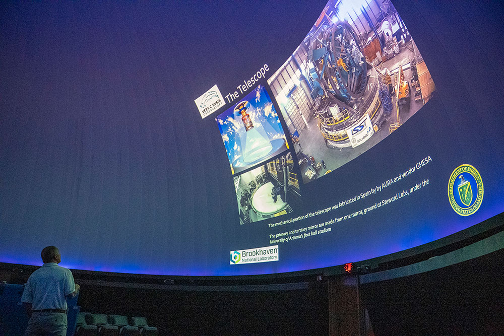 photo of a telescope presentation on a large planetarium screen