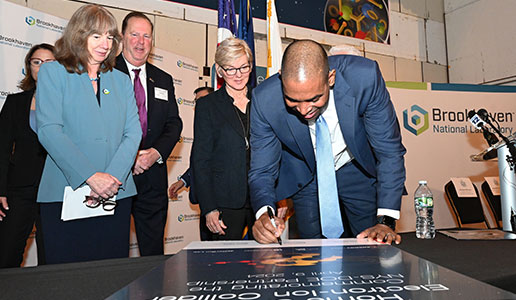 photo of New York Lieutenant Governor Antonio Delgado signing commemorative document