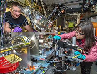 photo of resarcher at accelerator test facility