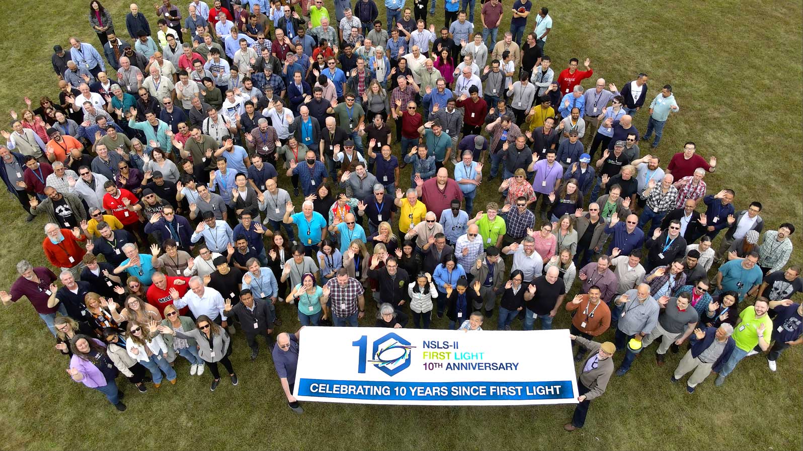 photo of crowd celebrating light source anniversary