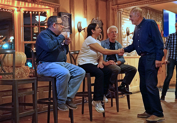 Photo of panelists interacting with audience