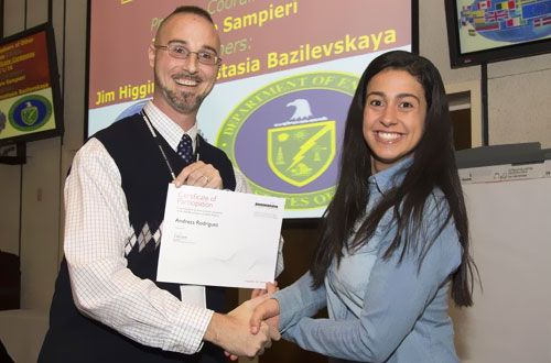 photo of teaching shaking hands with a student