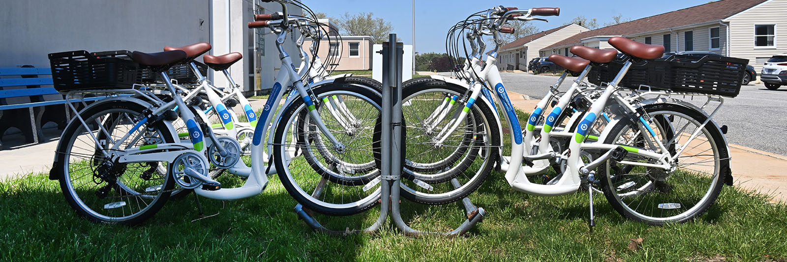 photo of a rack full of bicycles