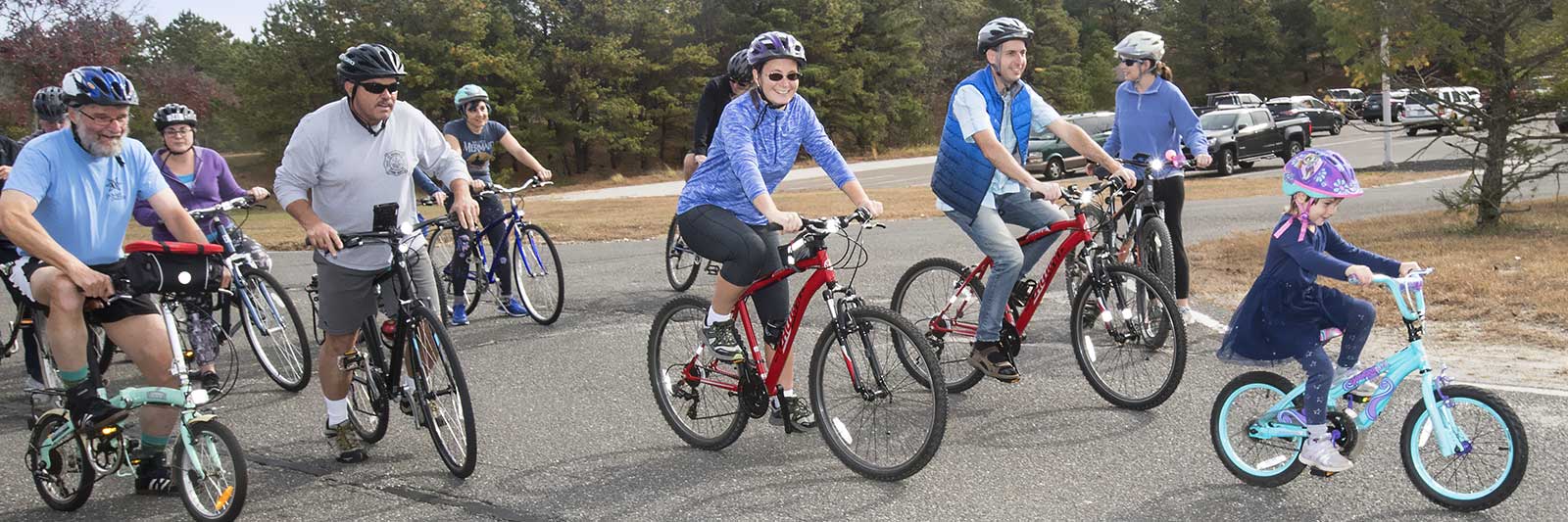 photograph of people bicycling