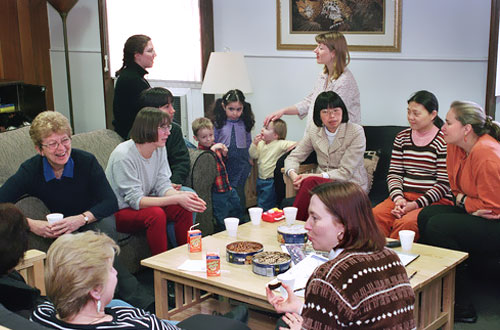 photo of women and children at a scoial function