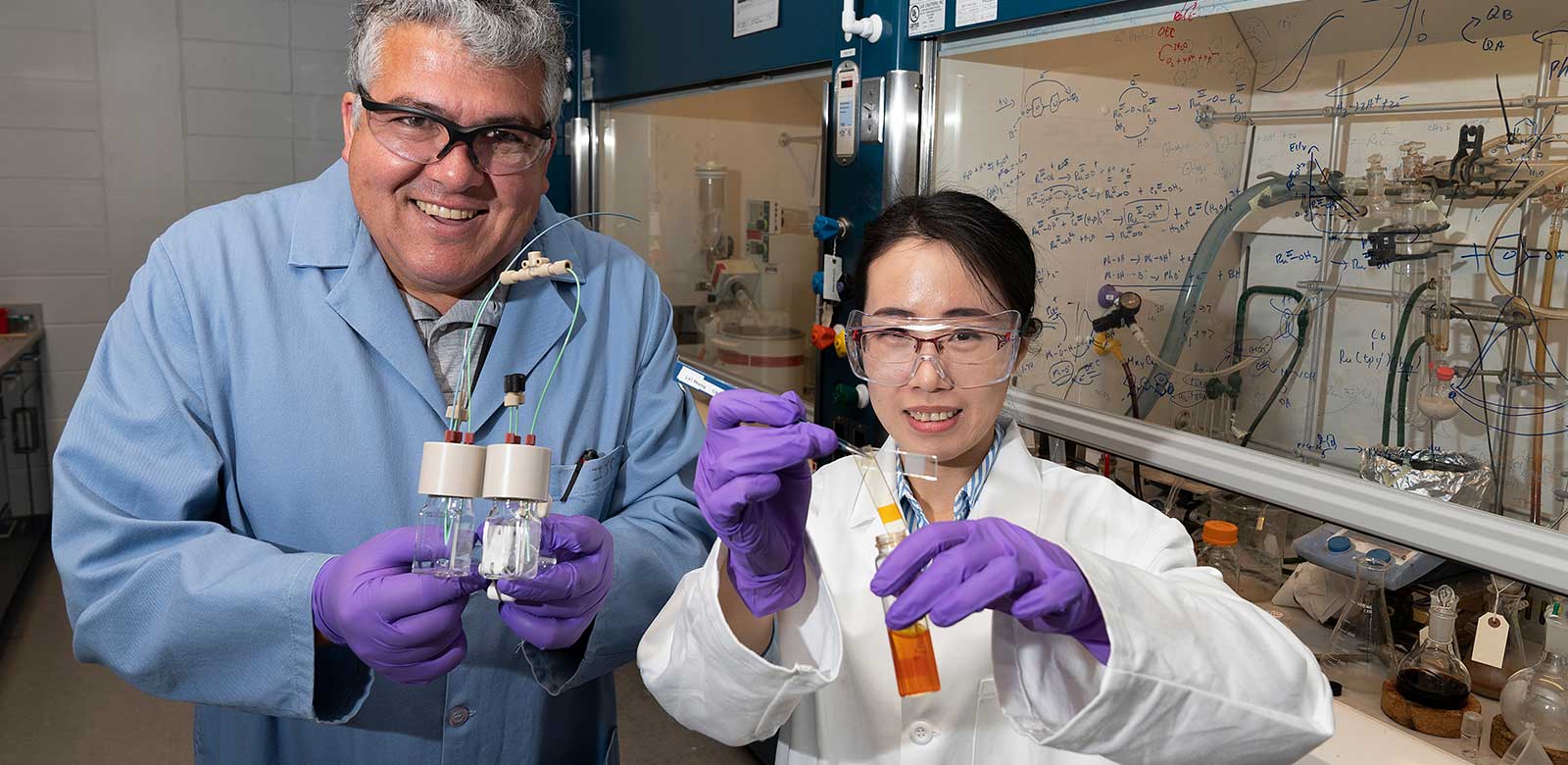 photo of chemists Javier Concepcion and Lei Wang