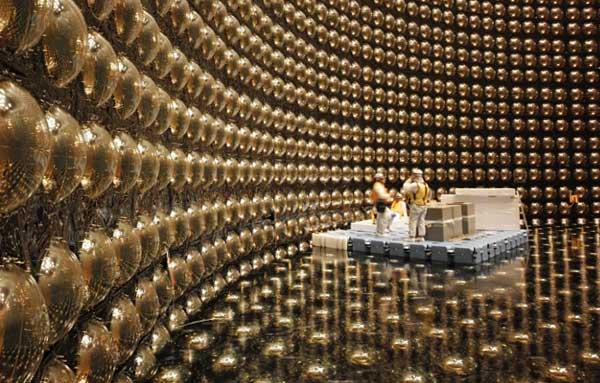 photo of technicians inside the super k detector