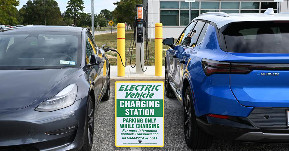 phoot of two cars plugged in to a charging station