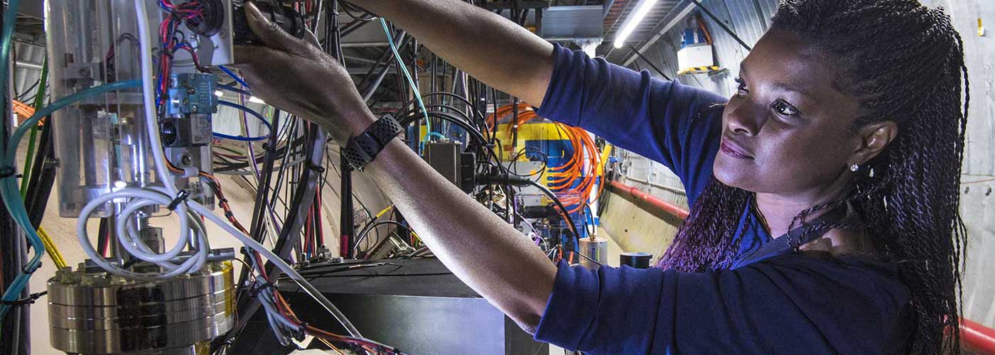 photo of woman working inside the RHIC ring