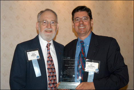 Photo of James Tarpinian receiving Davis Memorial Award