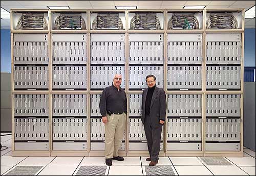 Edward McFadden and Nicholas Samios in front of QCDOC supercomputer
