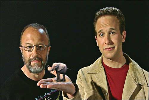 Photo of Physicist Ivan Schuller and host Adam Smith