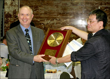 Photo of Ben-Zvi accepting award