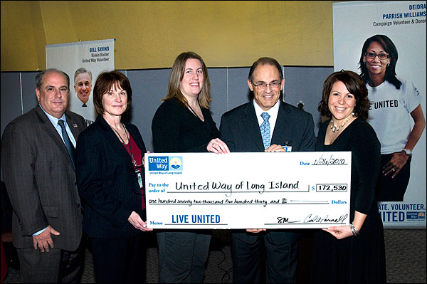 United Way representatives receive a $172,530 check