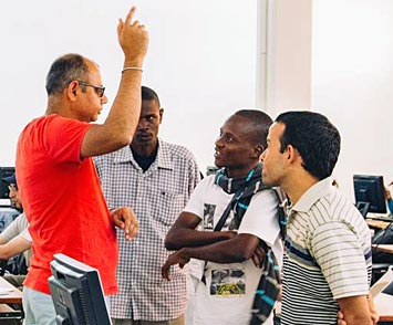 Bobby Acharya with students