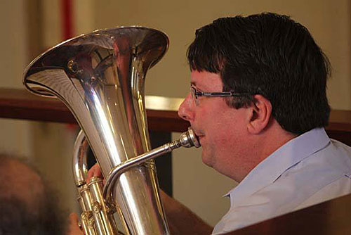 Jensen plays the euphonium during a concert