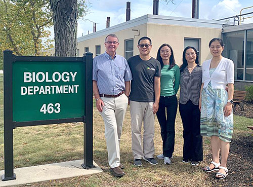 Photo of John Shanklin, Zhiyang Zhai, Yingqi Cai, Xiaohong Yu, and Hui Liu