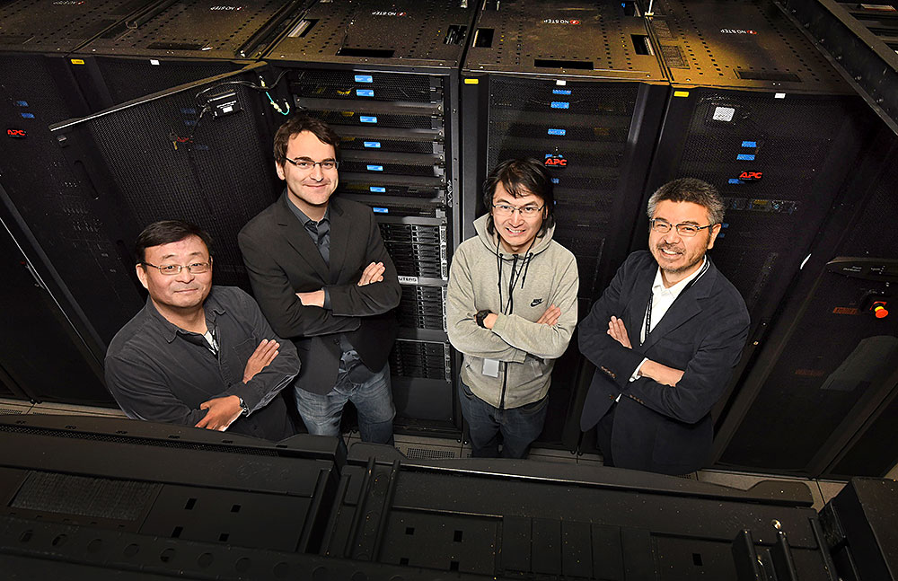 Photo of Chulwoo Jung, Christoph Lehner, Luchang Jin, and Taku Izubuchi