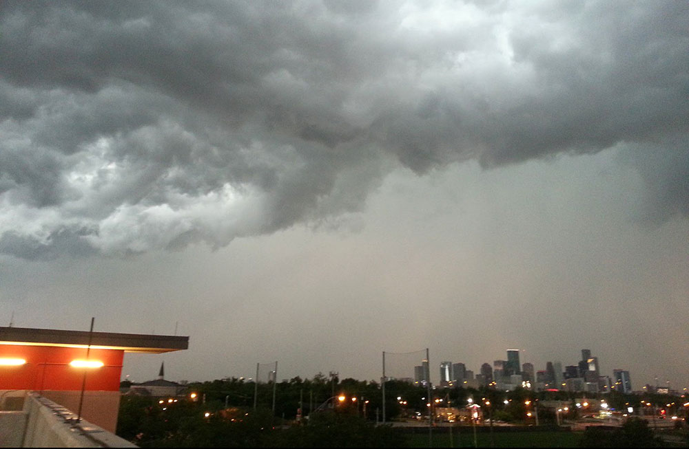 Photo of storm clouds over the Houston skyline