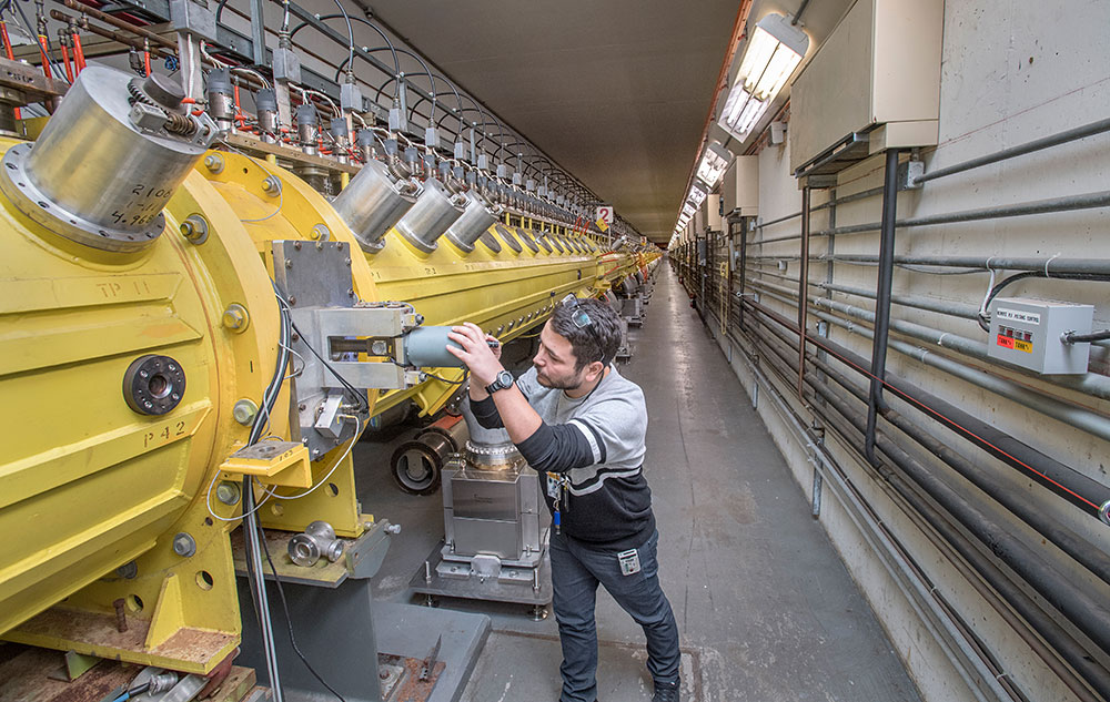 Photo of engineer performing maintenance on  the Brookhaven LINAC Isotope Producer