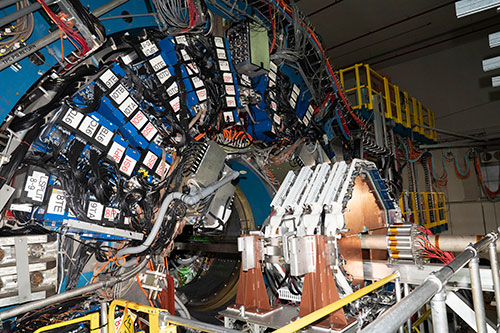 Photo of  STAR shows the endcap calorimeter electronics (blue with black cables) and four new planes