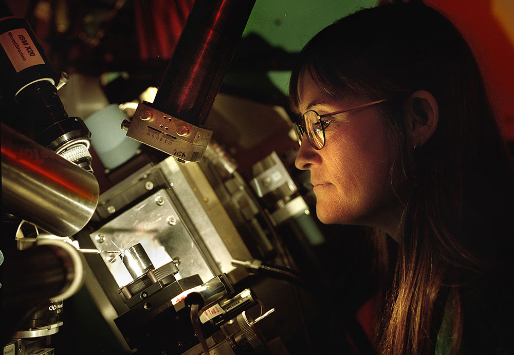 Photo of ean Jordan-Sweet with the microbeam setup at beamline X20A at NSLS