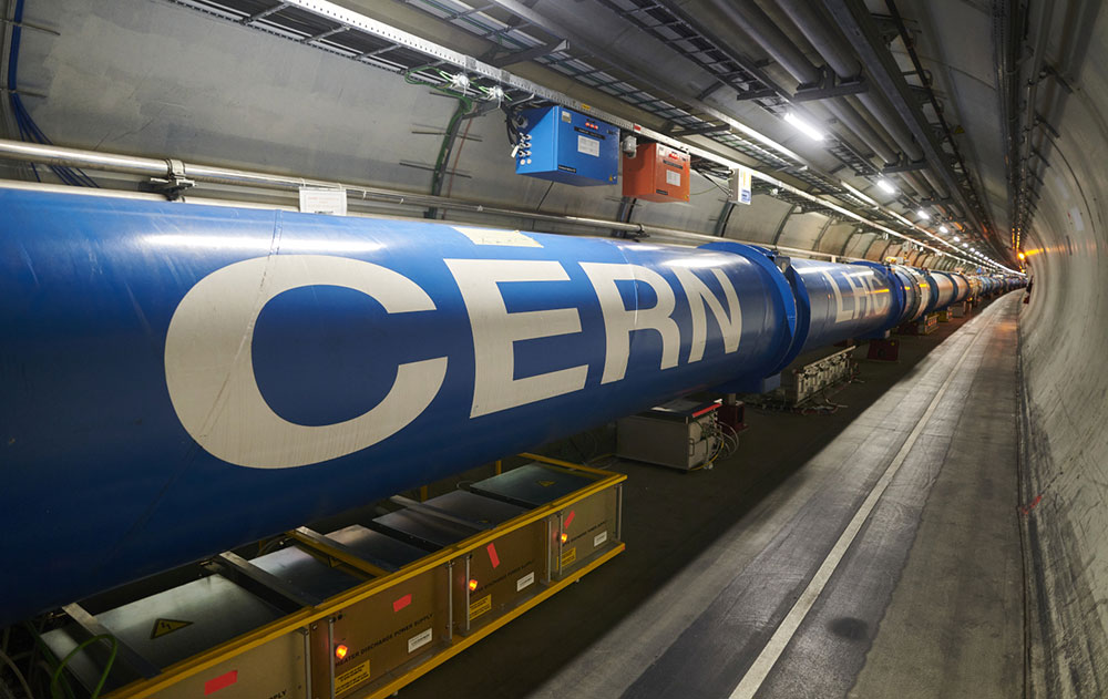 Photo of chain of LHC dipole magnets inside the LHC tunnel