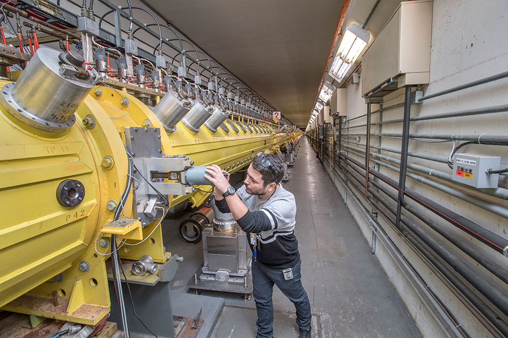 Photo of operator inside linear accelerator tunnel