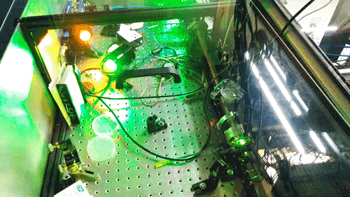 Gif od green laser light converting to orange laser light
