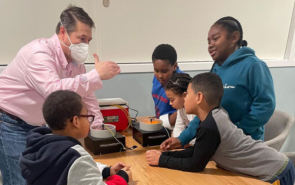 Scott Bronson engages participants from the Boys & Girls Club of the Shinnecock Nation in a less