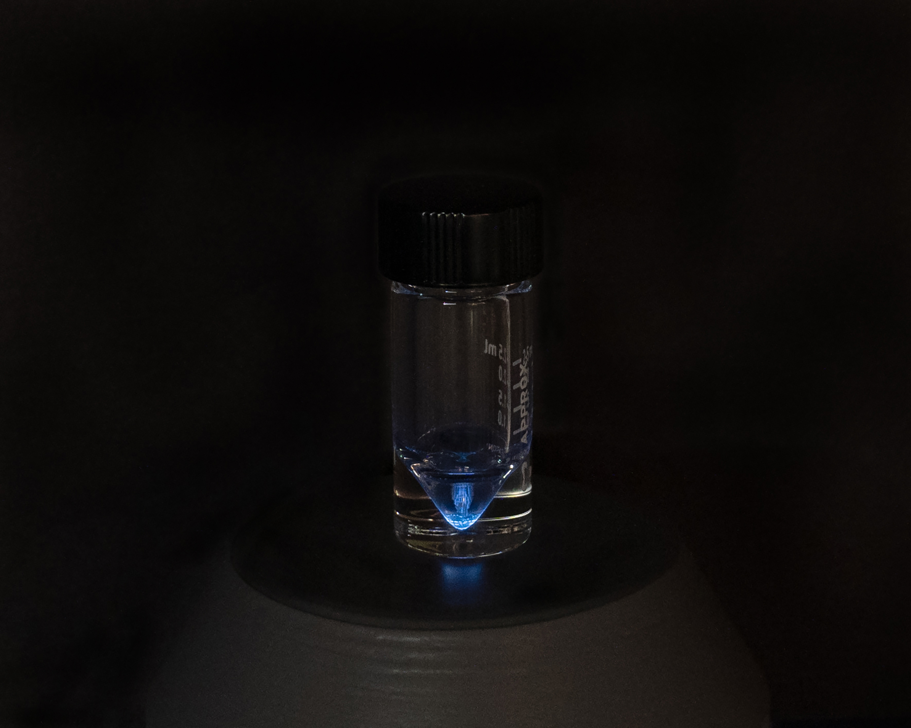 This long-exposure image makes it possible to see the glow of actinium-225, an isotope that shows great promise for treating cancer. 

