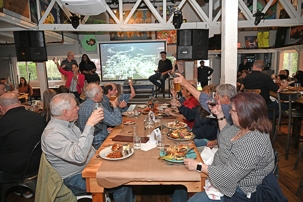 PubSci attendees raise their glasses for a toast