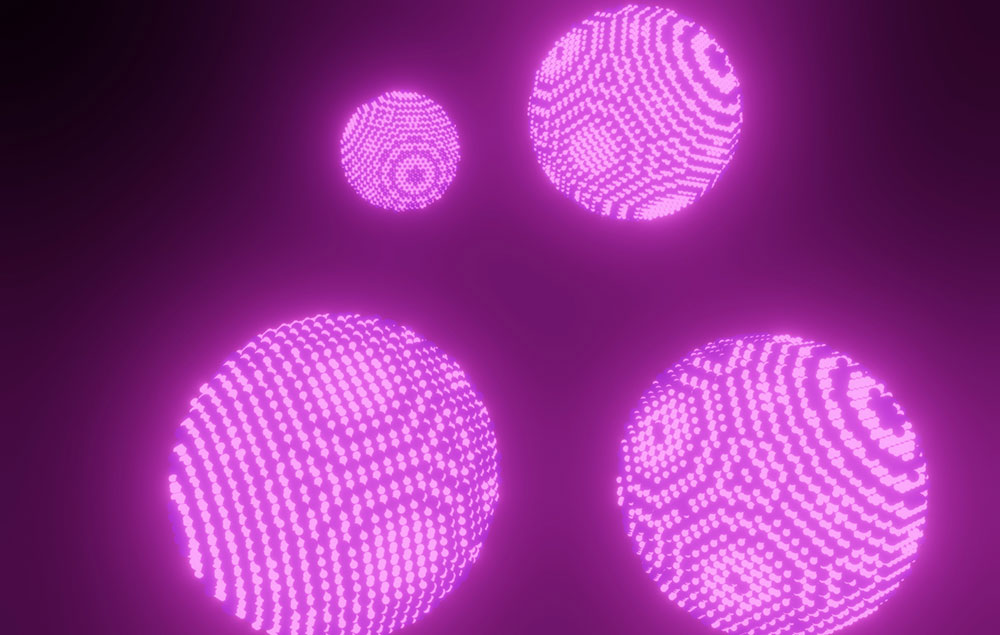 Pink spheres represent nanocrystal superlattices