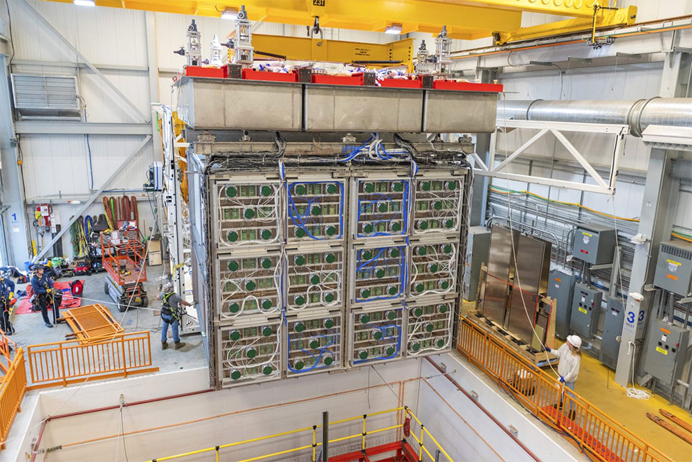Fermilab technicians and members of the SBND collaboration carefully lowered the detector system int