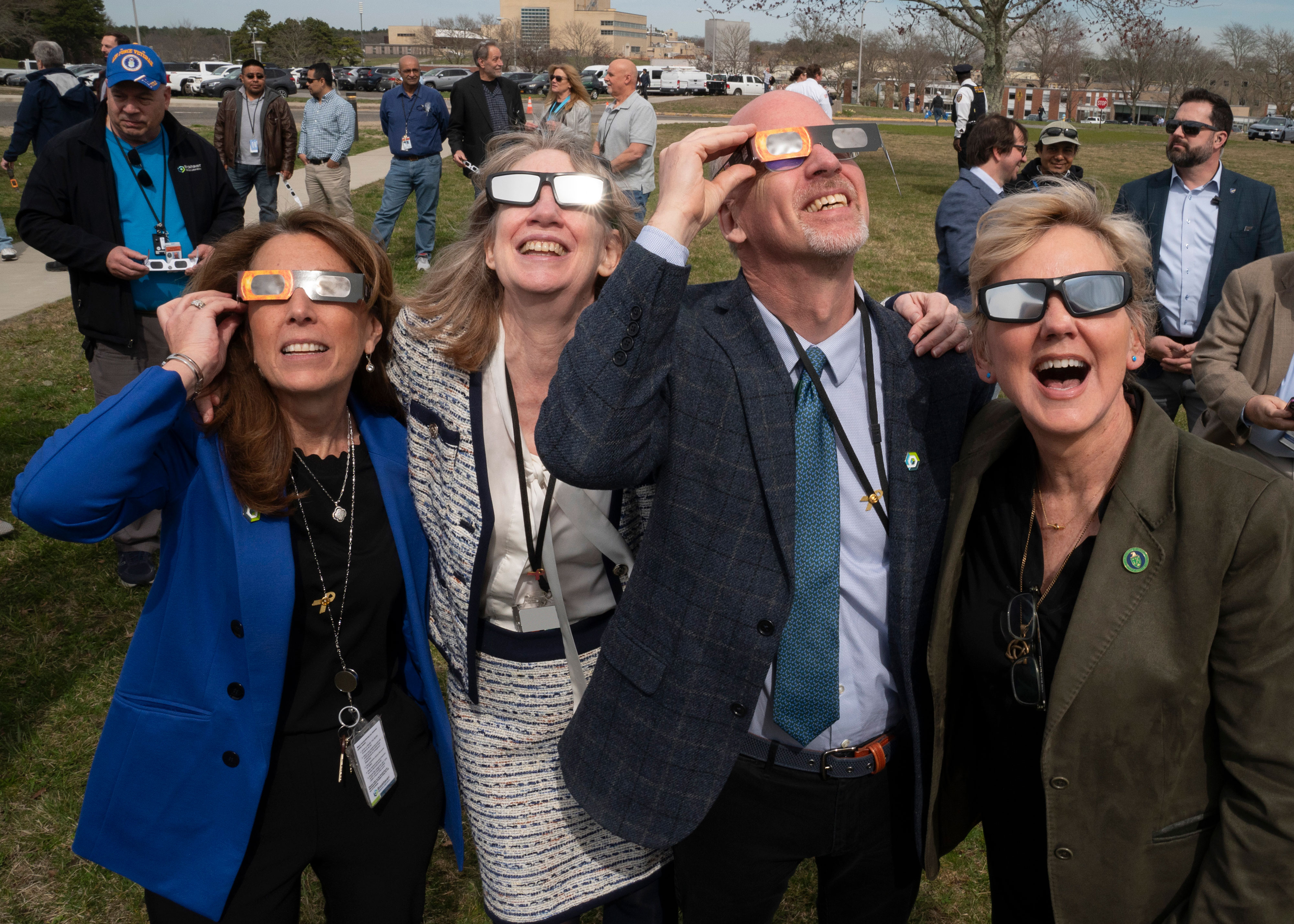From left to right: Deputy Director for Operations Ann Emrick, Laboratory Director JoAnne Hewett, Deputy Director for Science and Technology John Hill, and Secretary Granholm during the solar eclipse on April 8.