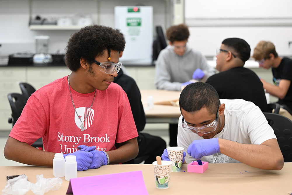 Students prepare cement mixture