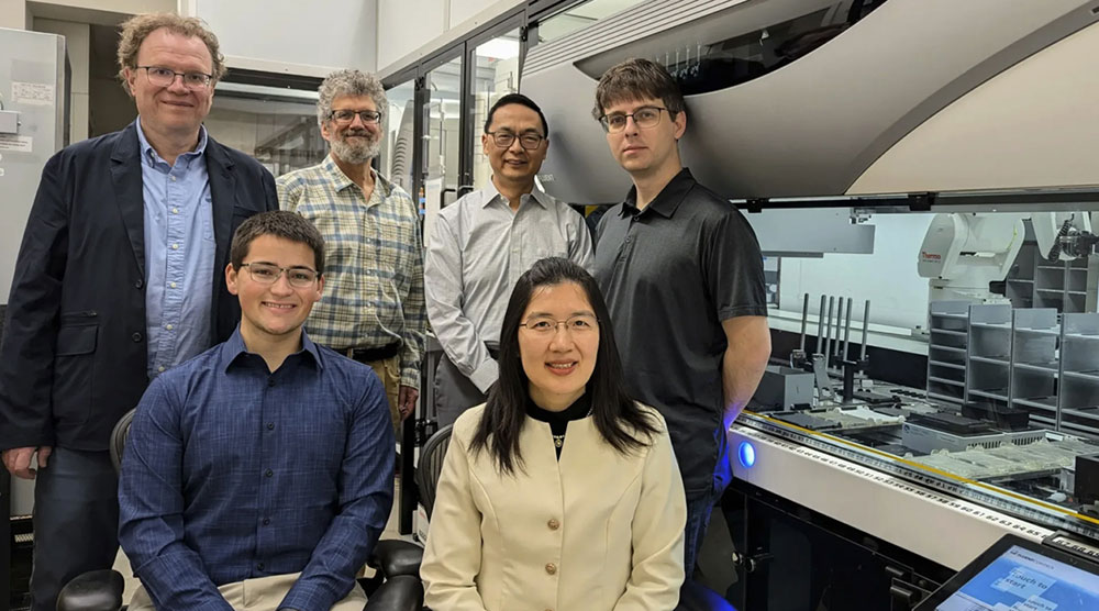 Front row, Graduate Student Seth Croslow and Research Scientist Jia Dong. Back row, from left: Co-PI