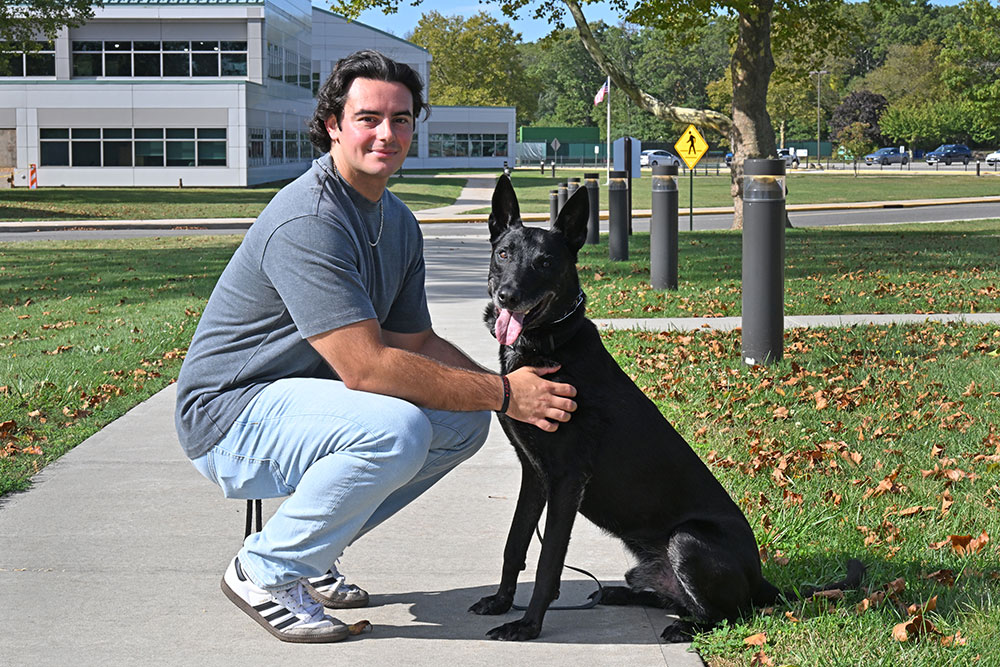 Nick Martucci and Remco, a Belgian Malinois