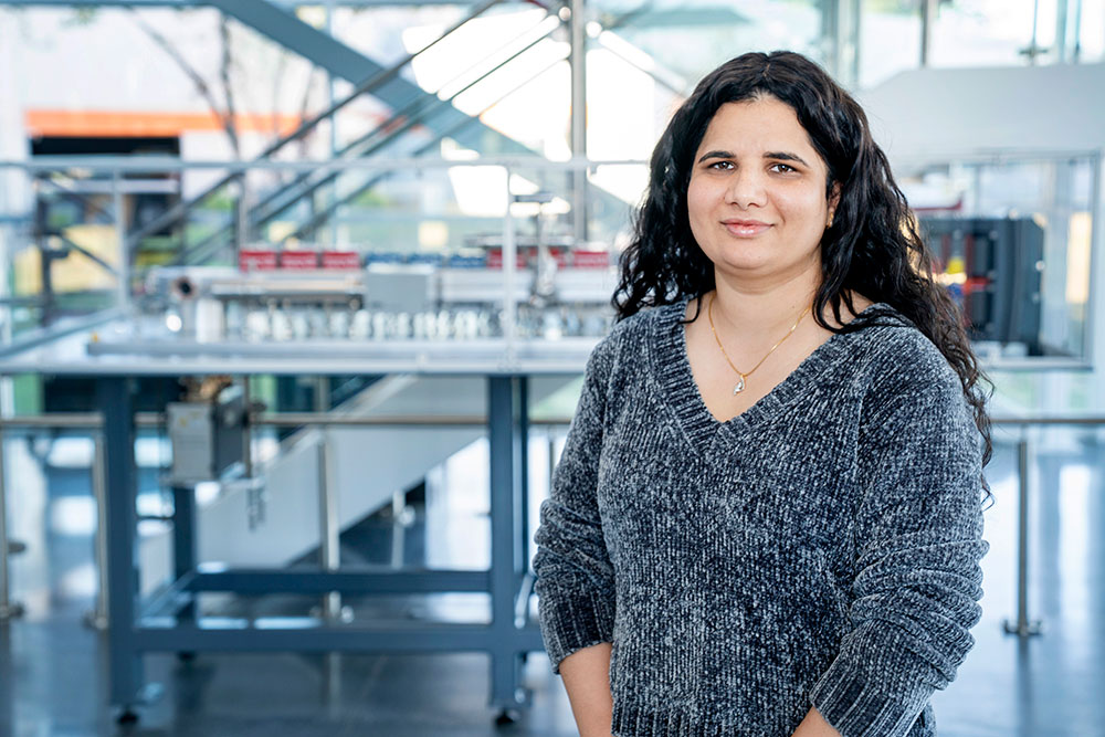 Aamna Khan in the main lobby of the National Synchrotron Light Source II