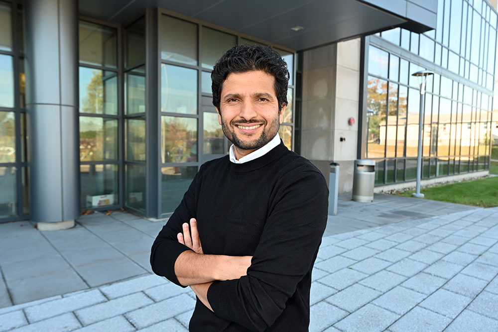 Niraj Aryal outside the Interdisciplinary Science Building at Brookhaven Lab