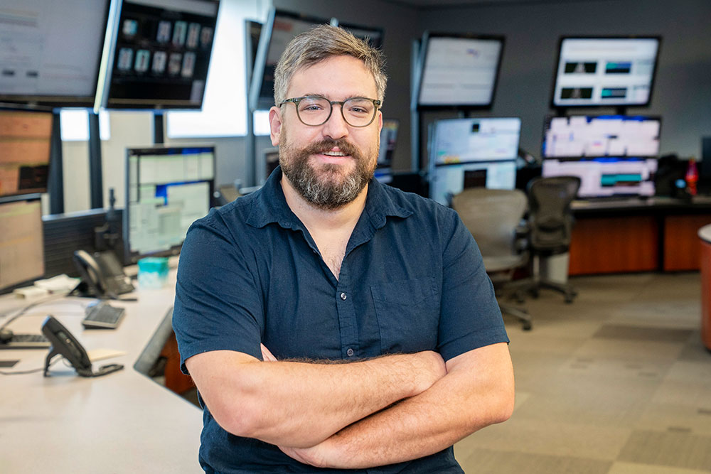 Kiel Hock in the main control room of the Relativistic Heavy Ion Collider