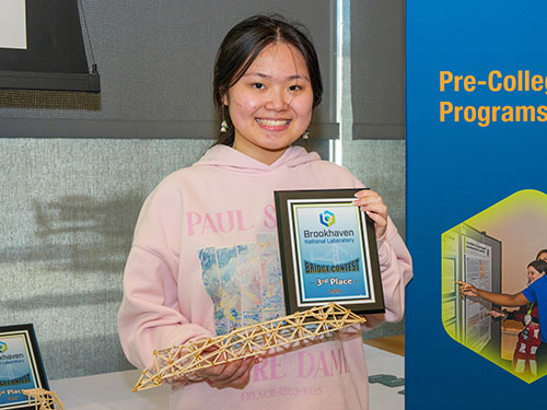 Chloe Lin holds her bridge and third-place award